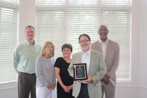 Dr. John Walsh receives award